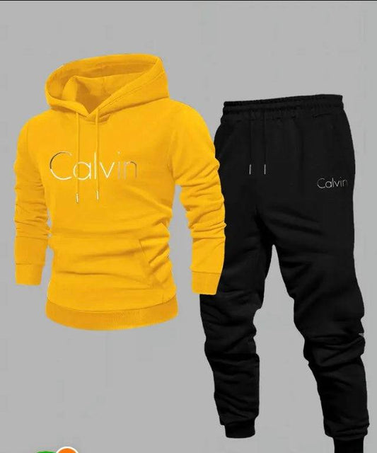 Calvin Klein jumper and sweatpants set with yellow hoodie and black joggers for casual wear